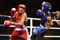 Robenilson Vieira em combate com Anvar Yunusov, do Tajiquistão, nos jogos de Beijing 2008. Foto: Washington Alves / COB
